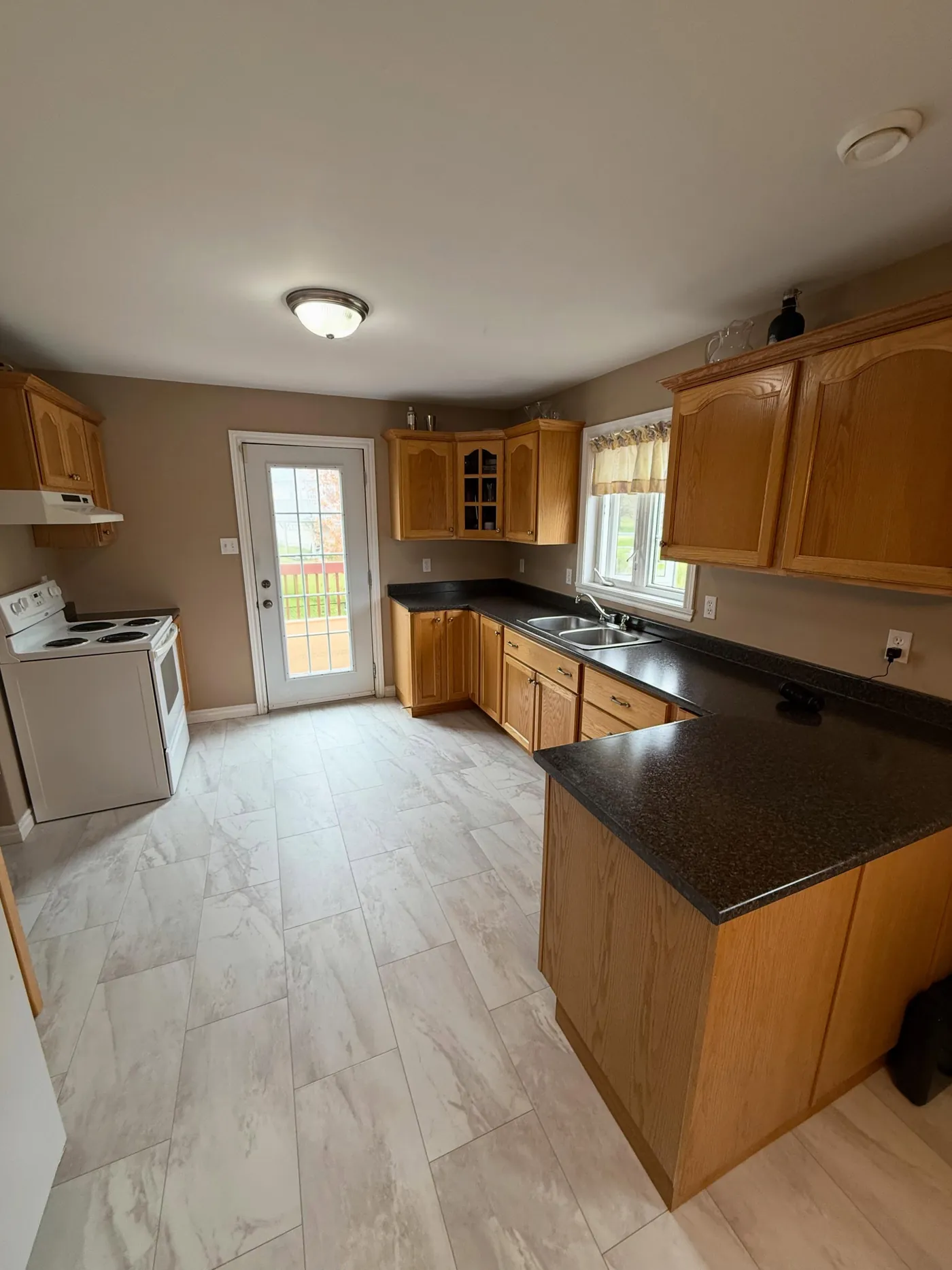 Oak kitchen renovation completed by Nova Core Construction in Bedford